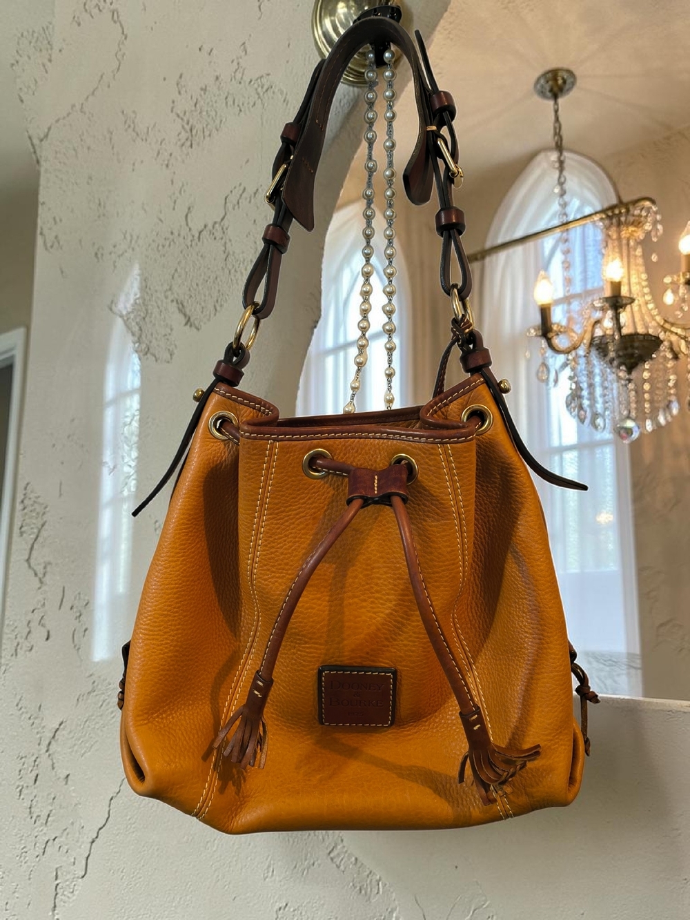 Dooney & Bourke Pebble Grain Drawstring Bucket Bag TanTassel Leather Bag